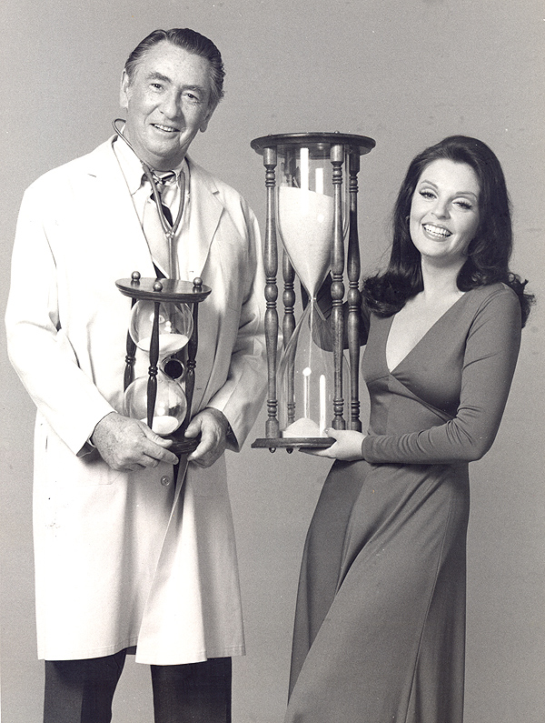 With MacDonald Carey